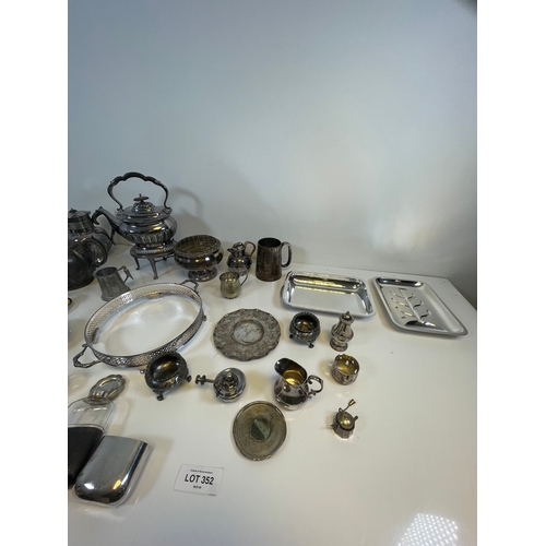 352 - A collection of miscellaneous collectable metallic items including silver plated.