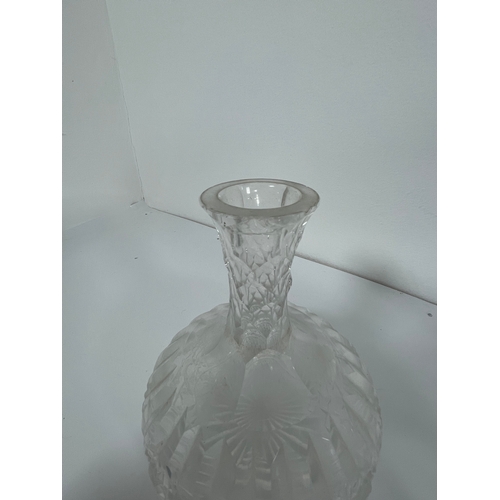 361 - A collection of crystal and glass decanters, vases jugs and wine glasses.