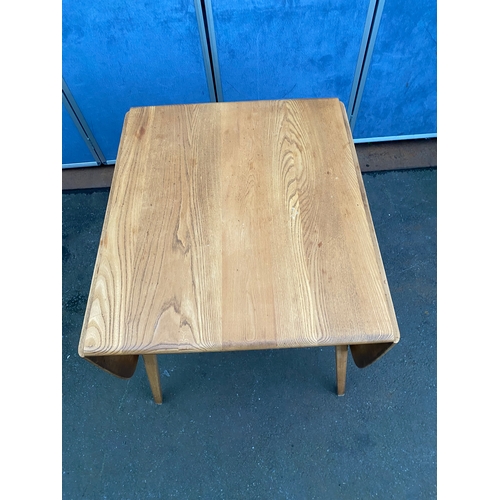 532 - Mid Century Ercol drop leaf plank table and four Ercol Candlestick chairs.