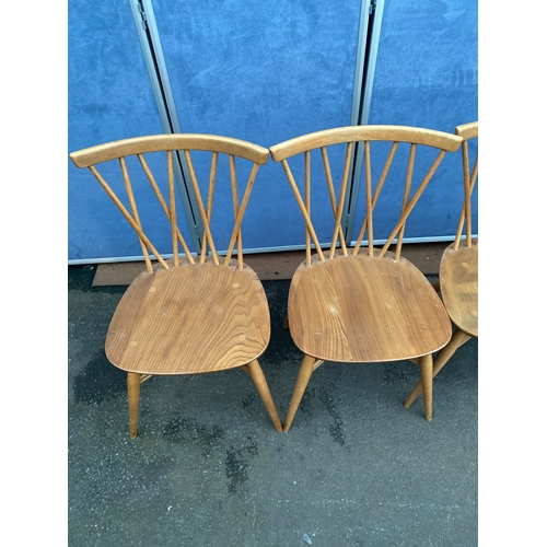 532 - Mid Century Ercol drop leaf plank table and four Ercol Candlestick chairs.