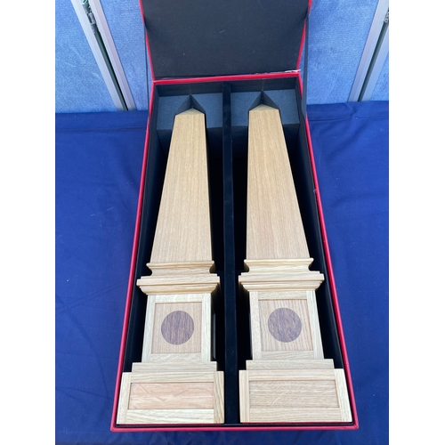 404 - A pair of wooden Obelisk Cognac cases.