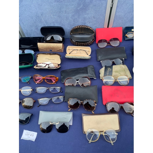 413 - Large collection of Miscellaneous Sun glasses/ reading glasses and cases