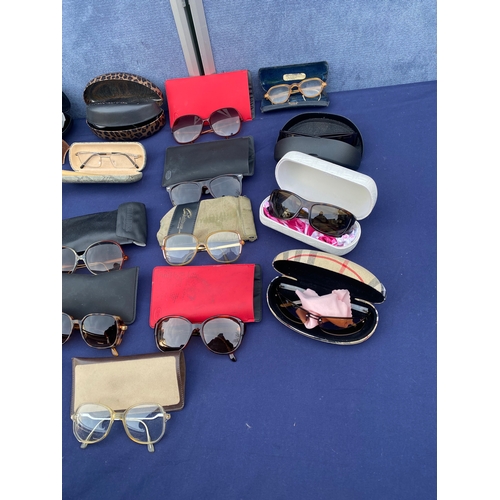 413 - Large collection of Miscellaneous Sun glasses/ reading glasses and cases