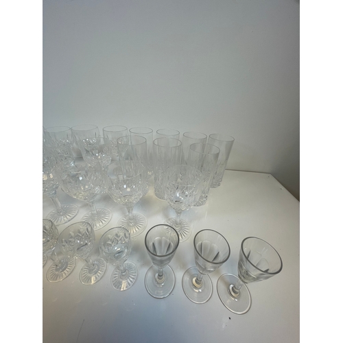 381 - A quantity of wine, sherry and tumbler glasses