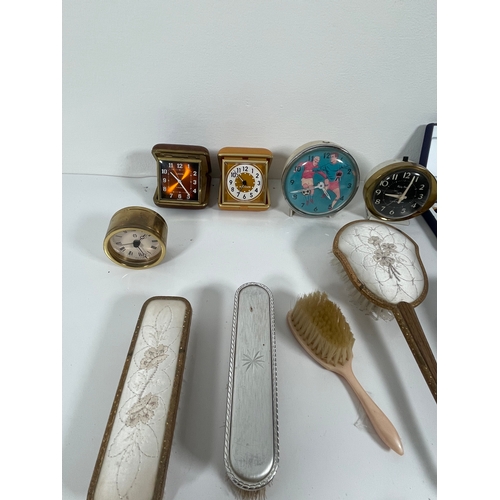 383 - A miscellaneous lot including Vanity items, spoons, pens and clocks