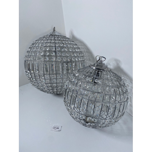 426 - Two globe chandeliers