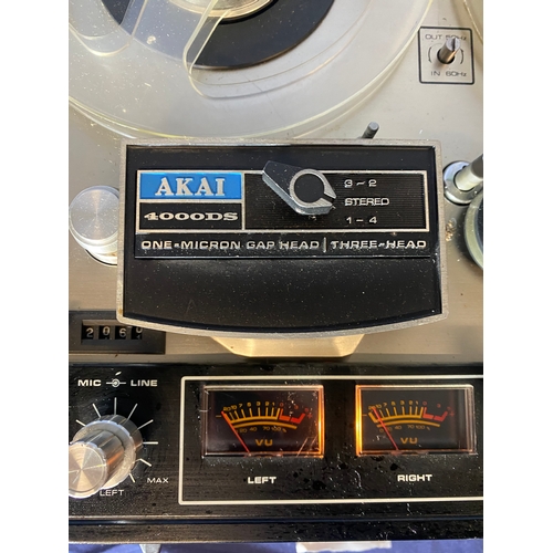 437 - AKAI 4000DS tape deck with Manual and miscellaneous reels.