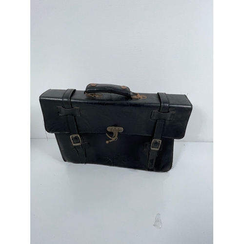 393 - A collection of Satchels/ Brief cases