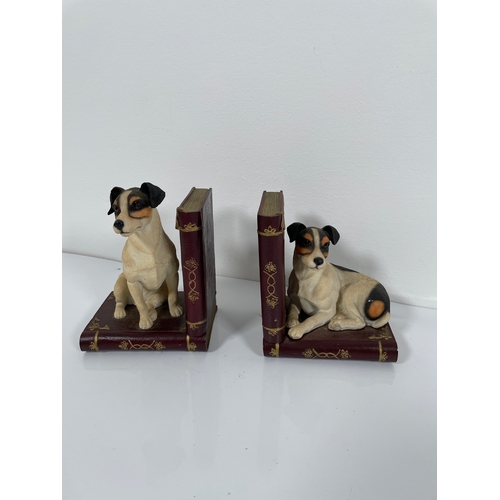 489 - A collection of dog ornaments and book ends.