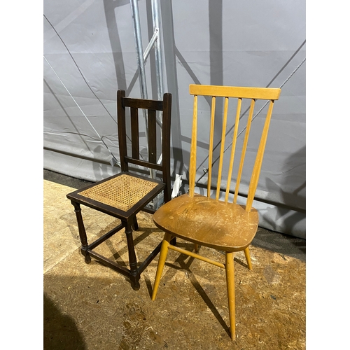 614 - A mid century Ercol chair and a rattan chair