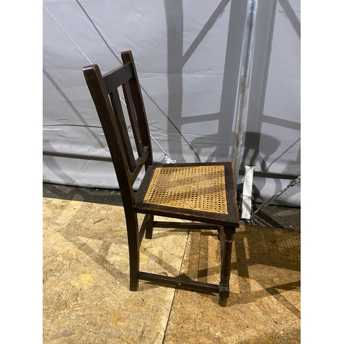 614 - A mid century Ercol chair and a rattan chair