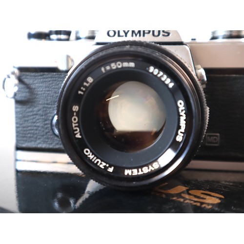 28 - Olympus OM-1 MD w/ Olympus F.Zuiko 50mm 1:1.8 lens with original box - serial number 1468502