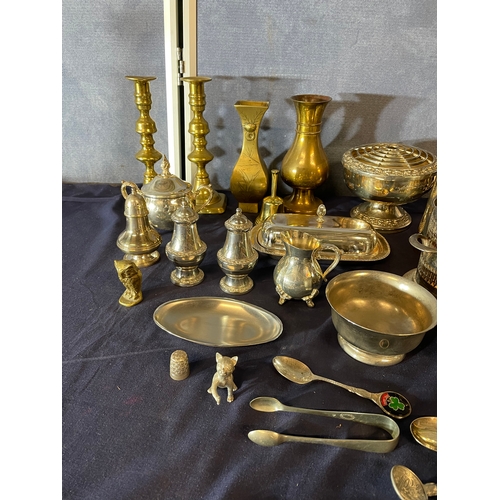 588 - Miscellaneous mixed metal collectables including cutlery, vases, candle stick holders and bowls