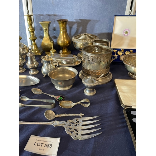 588 - Miscellaneous mixed metal collectables including cutlery, vases, candle stick holders and bowls