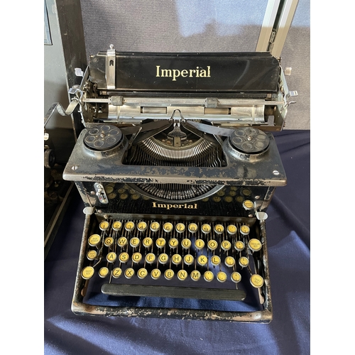 596 - Two Vintage type writers