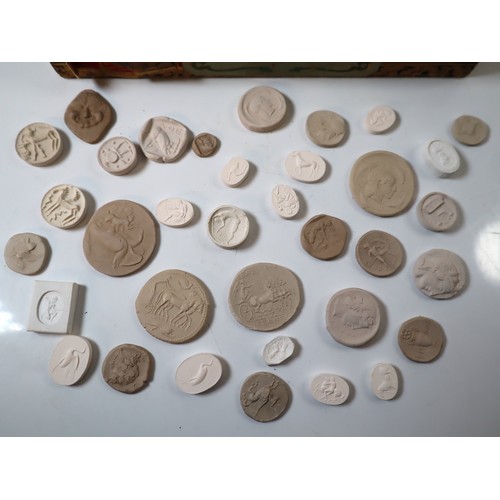 163 - Collection of plaster cast Greek coins and some rare lead votive offerings believed to be from the r... 