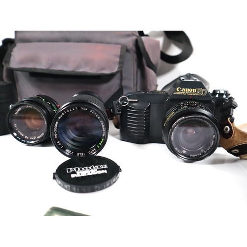 291 - Canon T50 35mm SLR Camera + lenses Canon FD 50mm f1.8 + Super Paragon f4.5 80-200mm/ flash and carry... 