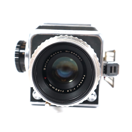 184 - Hasselblad 500 C/M Camera w/ Zeiss-Opton Tessar f2.8 80mm lens and two Hasselblad Film backs with ac... 