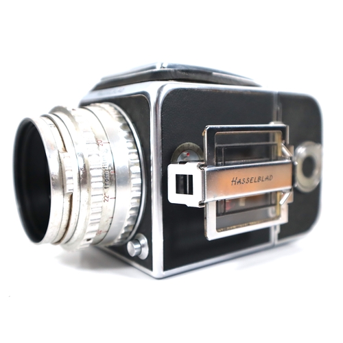 184 - Hasselblad 500 C/M Camera w/ Zeiss-Opton Tessar f2.8 80mm lens and two Hasselblad Film backs with ac... 