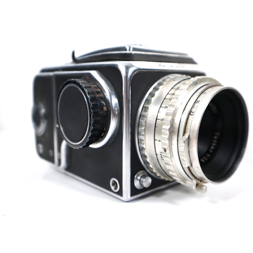 184 - Hasselblad 500 C/M Camera w/ Zeiss-Opton Tessar f2.8 80mm lens and two Hasselblad Film backs with ac... 