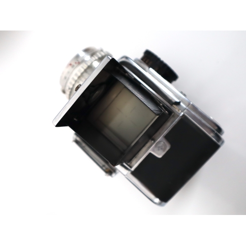 184 - Hasselblad 500 C/M Camera w/ Zeiss-Opton Tessar f2.8 80mm lens and two Hasselblad Film backs with ac... 