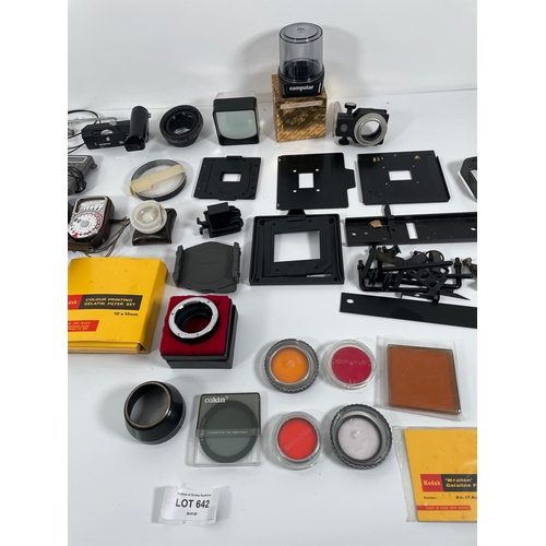 642 - A large quantity of photography equipment including lenses