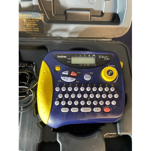 696 - Brother P-touch label printer and Baxter bag warmer