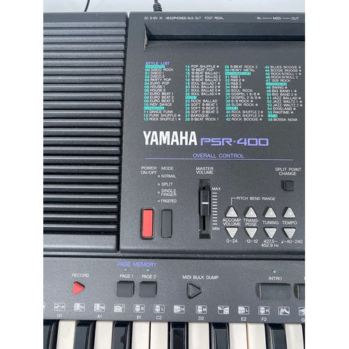 249 - Yamaha PSR-400 Electric keyboard and stand.