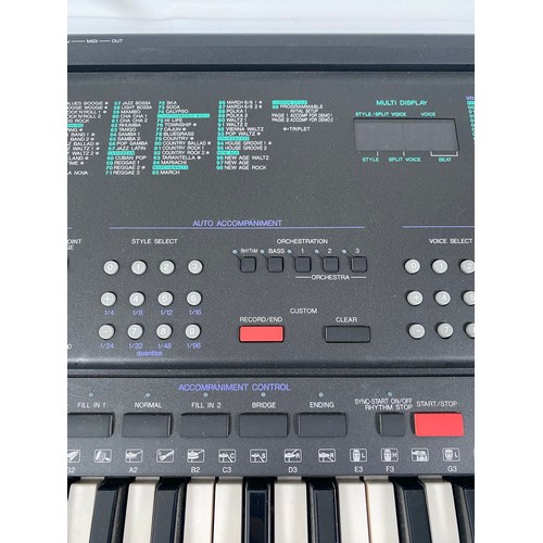 249 - Yamaha PSR-400 Electric keyboard and stand.