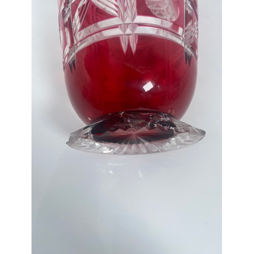 709 - A collection of Crystal and class Vases, Bowls and decanters.