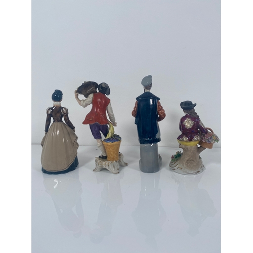 711 - Four ceramic collectable figurines and Two Wedgwood Vases