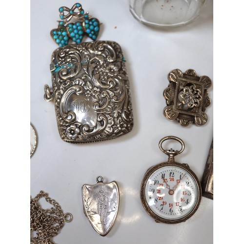 206 - A group of Sterling Silver Jewellery & Collectables, Victorian Vesta case, Ingots, pocket watch, nap... 