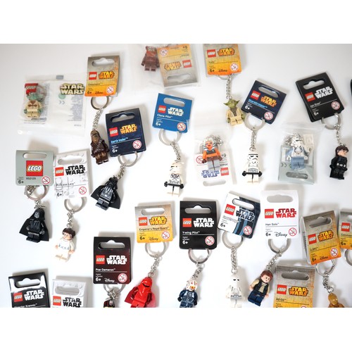 52 - LEGO Star Wars - A group of Keychains including Boba Fett, C-3P0, Darth Vader, Stormtroppers, Comman... 