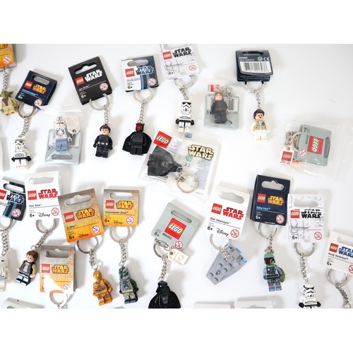 52 - LEGO Star Wars - A group of Keychains including Boba Fett, C-3P0, Darth Vader, Stormtroppers, Comman... 