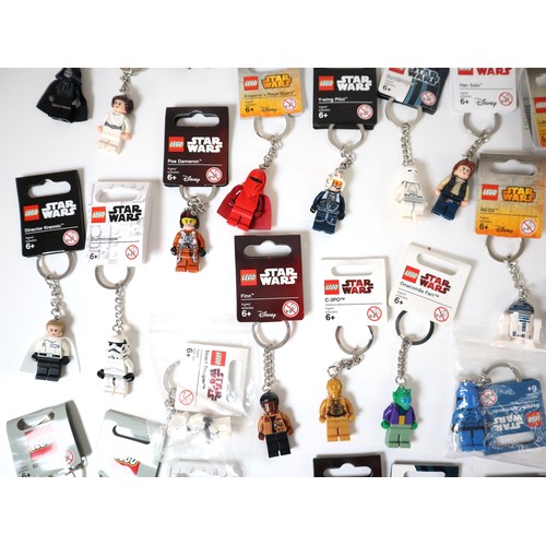 52 - LEGO Star Wars - A group of Keychains including Boba Fett, C-3P0, Darth Vader, Stormtroppers, Comman... 