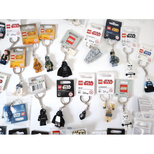 52 - LEGO Star Wars - A group of Keychains including Boba Fett, C-3P0, Darth Vader, Stormtroppers, Comman... 