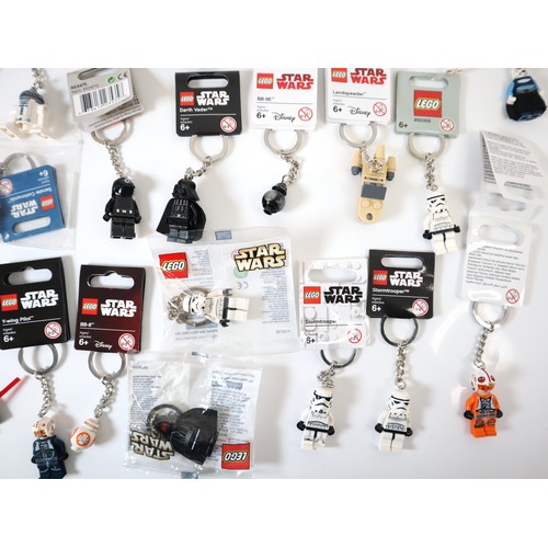 52 - LEGO Star Wars - A group of Keychains including Boba Fett, C-3P0, Darth Vader, Stormtroppers, Comman... 