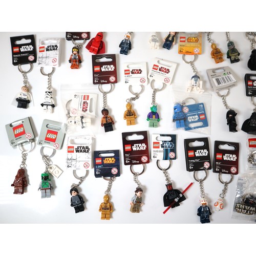 52 - LEGO Star Wars - A group of Keychains including Boba Fett, C-3P0, Darth Vader, Stormtroppers, Comman... 