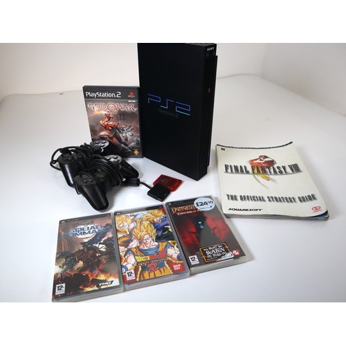 115 - Sony Playstation 2 Console with 2 controllers + 1 game & 3 PSP Games