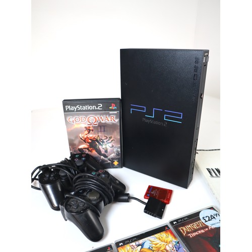 115 - Sony Playstation 2 Console with 2 controllers + 1 game & 3 PSP Games