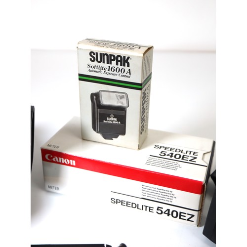 34 - A group of Canon Flashes including Speedlight 540ez x 2, Speedlight 430ez x2 Godox X Pro c TTL Wirel... 
