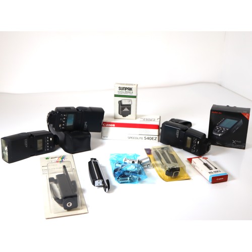 34 - A group of Canon Flashes including Speedlight 540ez x 2, Speedlight 430ez x2 Godox X Pro c TTL Wirel... 