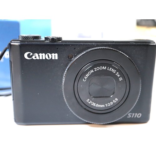 38 - A group of digital cameras including Canon Powershot s110, Fujifilm S5000, Canon Powershot S70, Cano... 