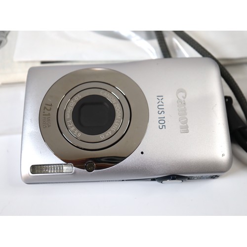 38 - A group of digital cameras including Canon Powershot s110, Fujifilm S5000, Canon Powershot S70, Cano... 