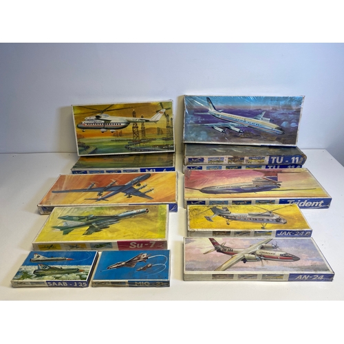 314 - A collection of Model plane assembly kits including, Trident M1:100, Two MI-6, Tu-20, Su-7, SAAB-J35... 