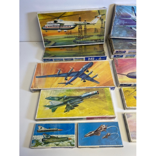 314 - A collection of Model plane assembly kits including, Trident M1:100, Two MI-6, Tu-20, Su-7, SAAB-J35... 