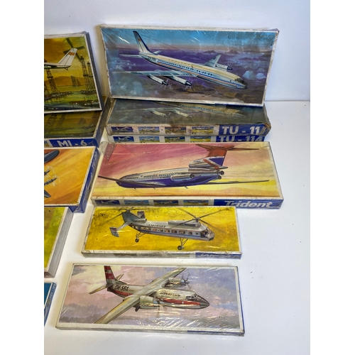 314 - A collection of Model plane assembly kits including, Trident M1:100, Two MI-6, Tu-20, Su-7, SAAB-J35... 