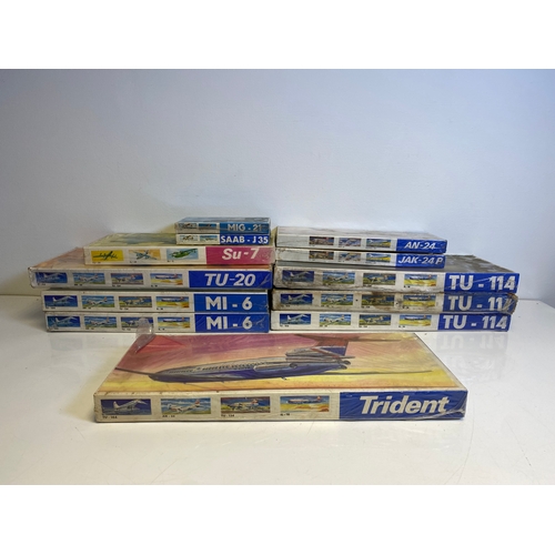 314 - A collection of Model plane assembly kits including, Trident M1:100, Two MI-6, Tu-20, Su-7, SAAB-J35... 