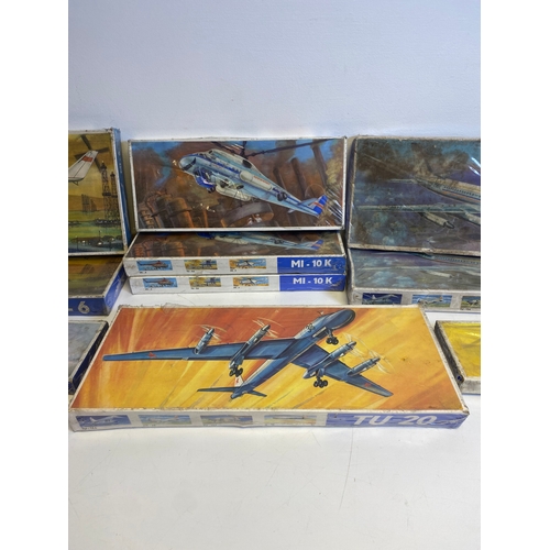 315 - A collection of model plane assembly kits including Turbolet L410, AN-24, JAK 24P, Three MI-10K Two ... 