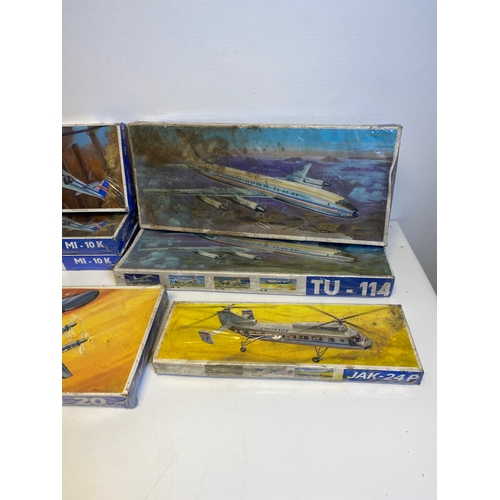 315 - A collection of model plane assembly kits including Turbolet L410, AN-24, JAK 24P, Three MI-10K Two ... 